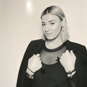 Black long sleeve sheer bodysuit with stars